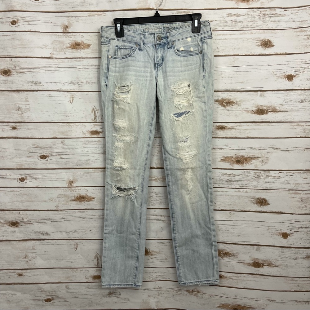 American Eagle Light Wash Distressed Bleach Spot Skinny Jeans